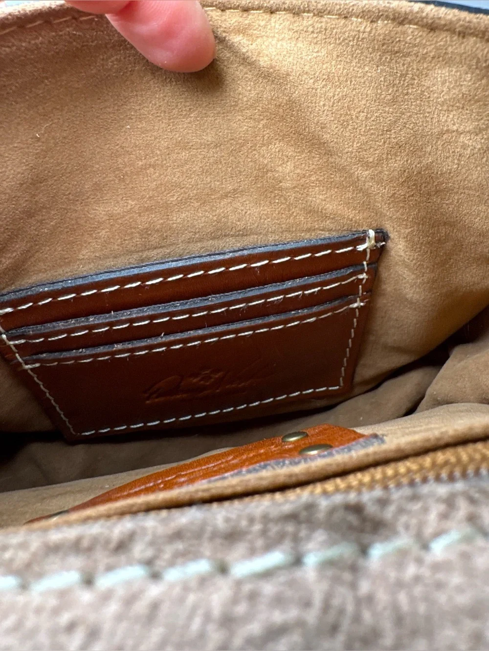 Patricia Nash Bonella Mini Crossbody Saddle Bag in their signature tan/cognac